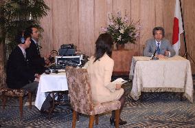 Koizumi voices reform resolve on radio